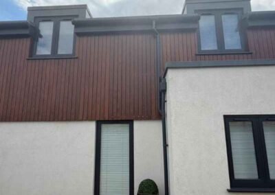 House that has had exterior rendering in Cambridge