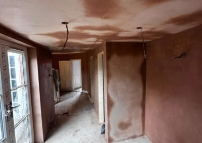 Plastering in a corridor